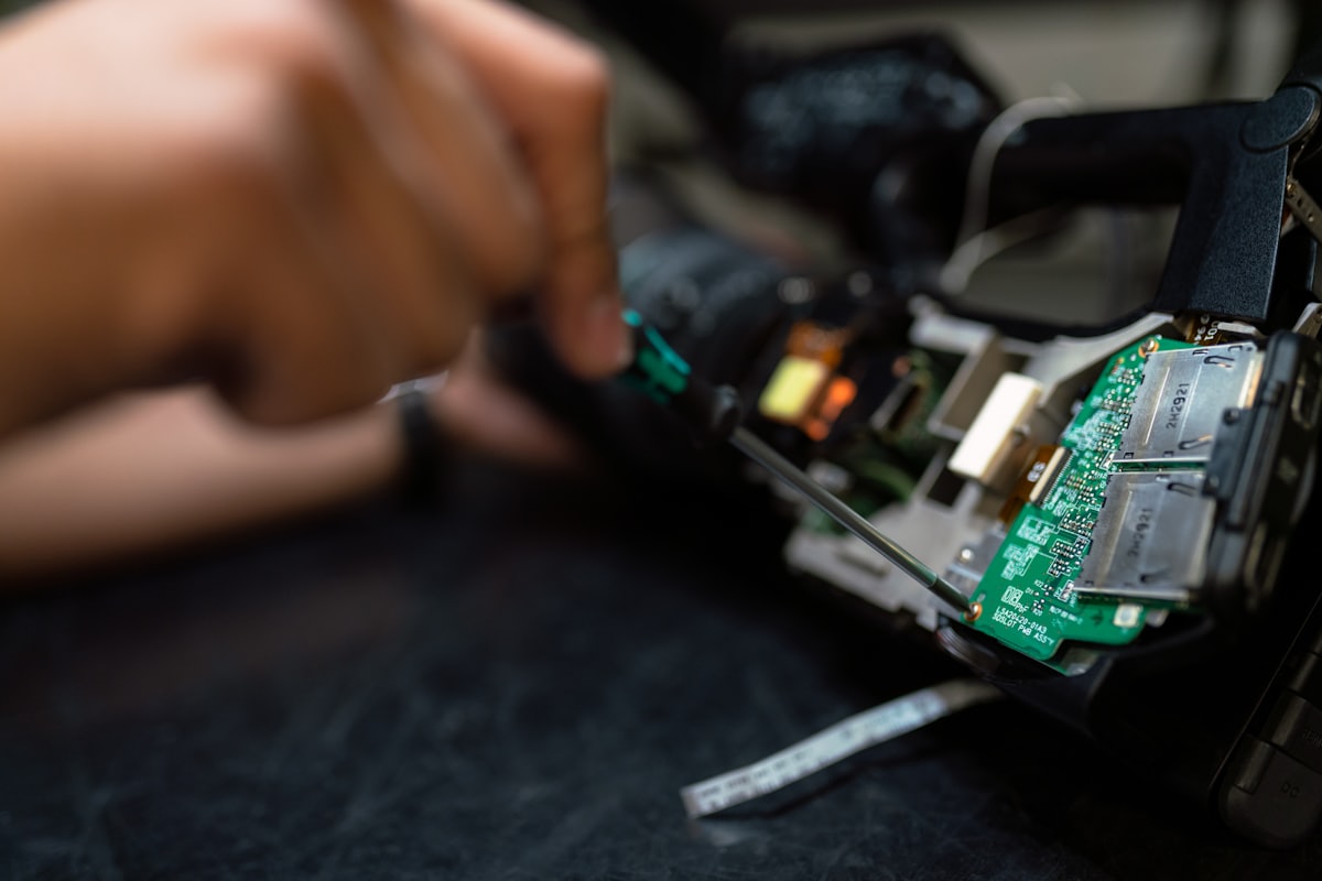 Close-up electronics rework on a circuit board
