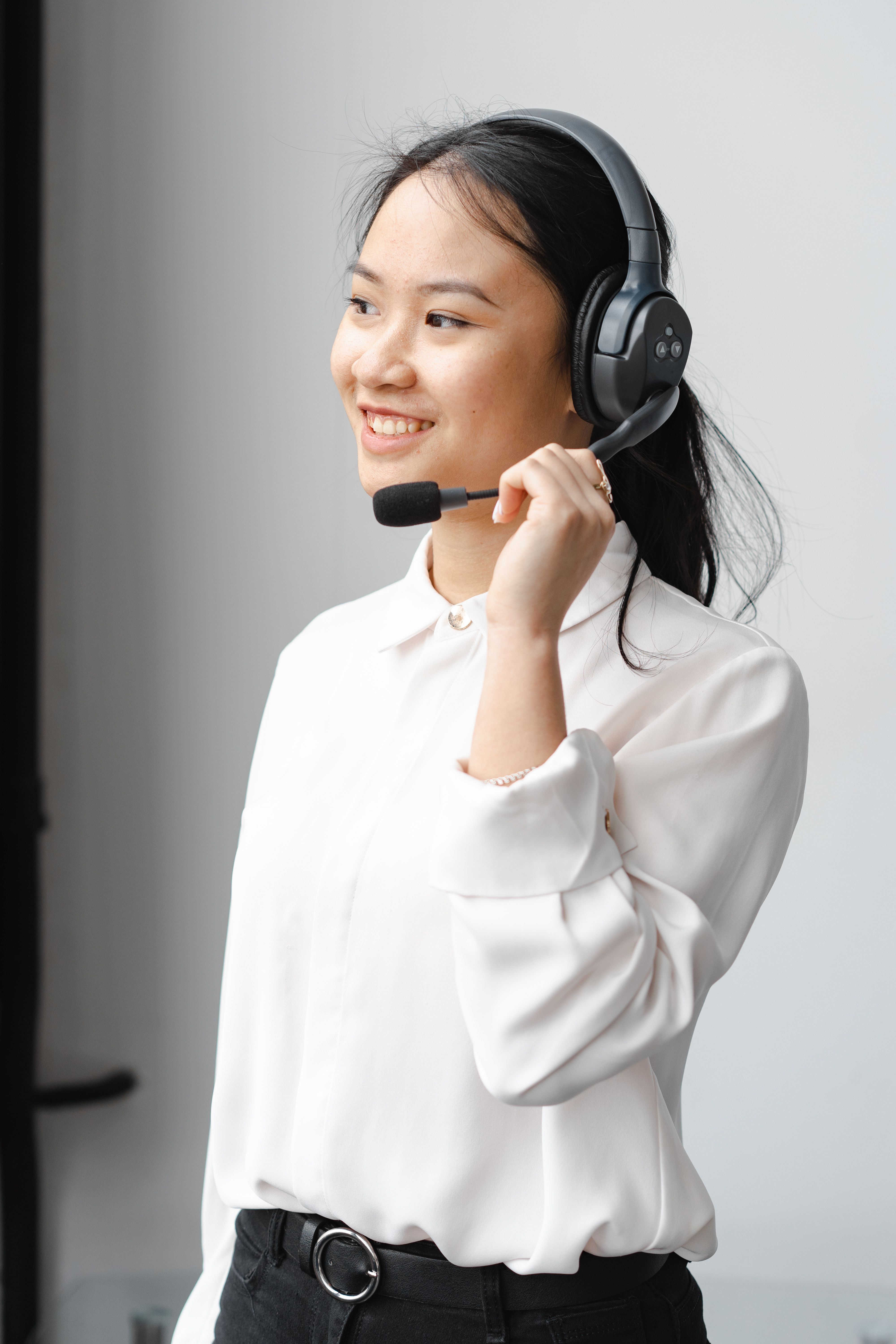 Support engineer with headset ready for technical inquiries